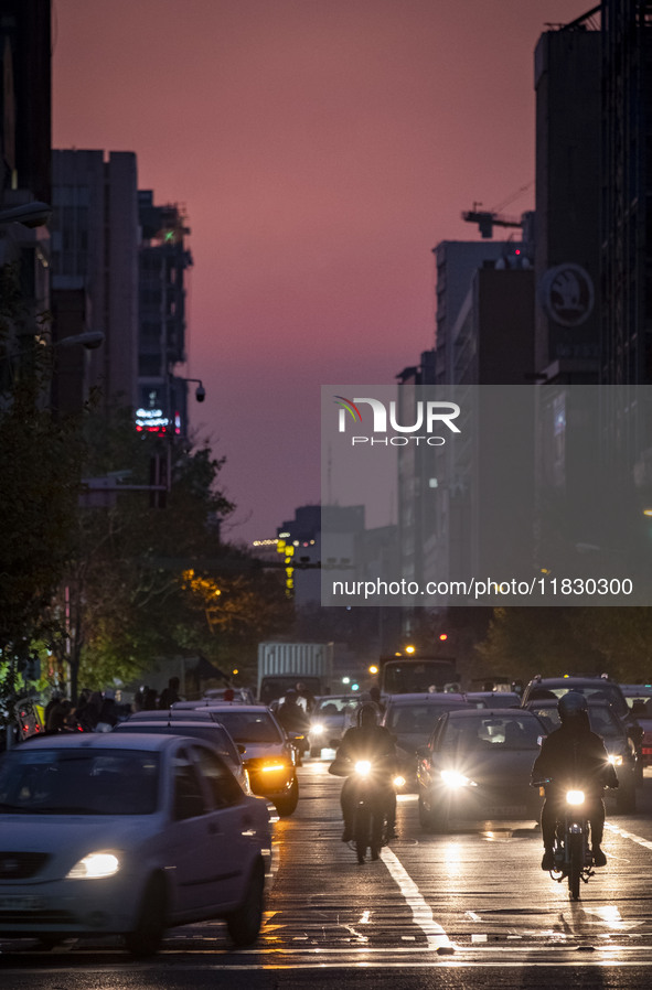 A view of a street in downtown Tehran, Iran, on December 2, 2024, at sunset. 