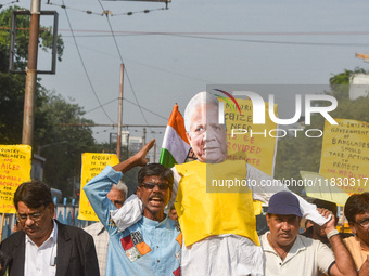 An effigy of Muhammad Yunus is seen during a protest organized by the South Kolkata District Congress in Kolkata, India, on December 3, 2024...