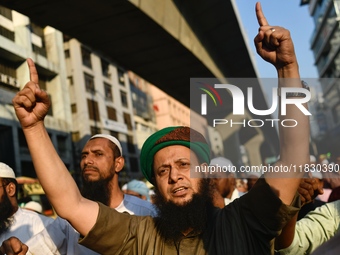 Islami Andolon Bangladesh stages a demonstration procession at the Baitul Mukarram mosque area in Dhaka, Bangladesh, on December 3, 2024. Th...