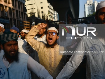 Islami Andolon Bangladesh stages a demonstration procession at the Baitul Mukarram mosque area in Dhaka, Bangladesh, on December 3, 2024. Th...