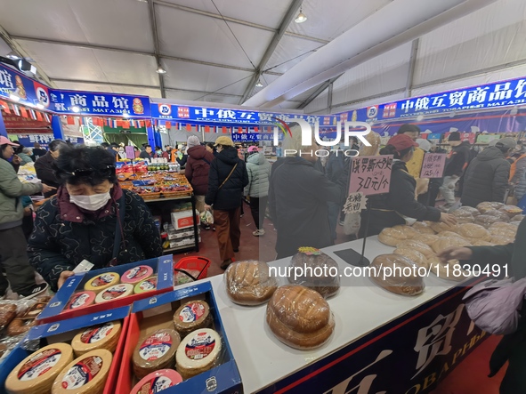 Citizens buy Russian goods at the Wukesong Sino-Russian Mutual Trade Pavilion in Beijing, China, on December 3, 2024. 