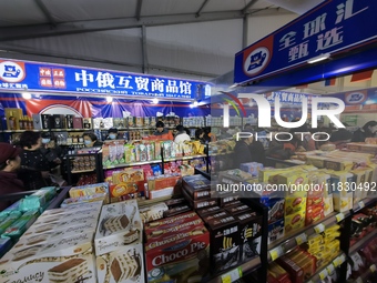 Citizens buy Russian goods at the Wukesong Sino-Russian Mutual Trade Pavilion in Beijing, China, on December 3, 2024. (