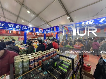 Citizens buy Russian goods at the Wukesong Sino-Russian Mutual Trade Pavilion in Beijing, China, on December 3, 2024. (