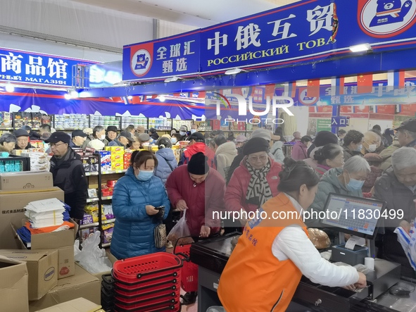 Citizens buy Russian goods at the Wukesong Sino-Russian Mutual Trade Pavilion in Beijing, China, on December 3, 2024. 