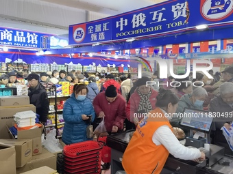 Citizens buy Russian goods at the Wukesong Sino-Russian Mutual Trade Pavilion in Beijing, China, on December 3, 2024. (