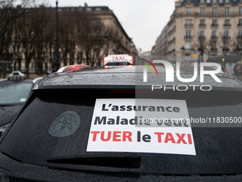 Taxi drivers gather at the Invalides in Paris, France, on December 3, 2024, during a demonstration against a new downward pricing system for...