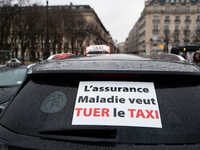 Taxi drivers gather at the Invalides in Paris, France, on December 3, 2024, during a demonstration against a new downward pricing system for...