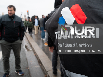 Taxi drivers gather at the Invalides in Paris, France, on December 3, 2024, during a demonstration against a new downward pricing system for...