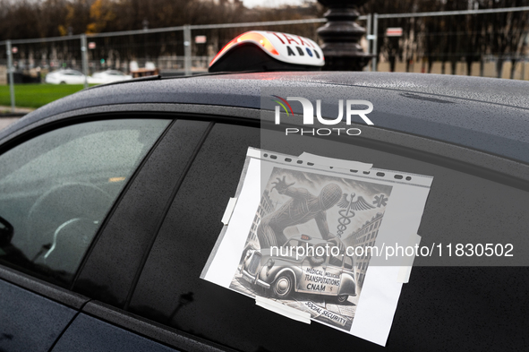 Taxi drivers gather at the Invalides in Paris, France, on December 3, 2024, during a demonstration against a new downward pricing system for...