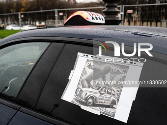 Taxi drivers gather at the Invalides in Paris, France, on December 3, 2024, during a demonstration against a new downward pricing system for...