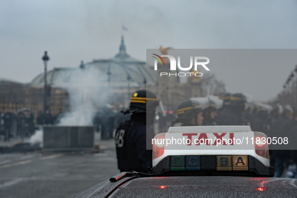 Taxi drivers gather at the Invalides in Paris, France, on December 3, 2024, during a demonstration against a new downward pricing system for...