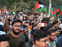 Activists of the Jatiya Nagarik Committee (National Citizens Committee) stage a protest rally against the attack on the Bangladesh Assistant...