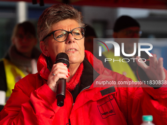 Henrike Eickholt, head of the state department of NRW, speaks during the rally at Harmonie Square in Rheydt, Germany, on December 3, 2024, d...