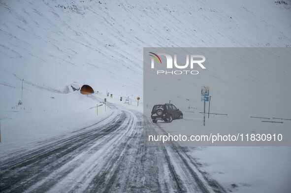 The alternate road 82 leads to the entrance of a tunnel on the road to the town of Olafsfjordur in Iceland on November 27, 2024. Roads in no...