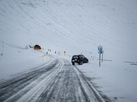 The alternate road 82 leads to the entrance of a tunnel on the road to the town of Olafsfjordur in Iceland on November 27, 2024. Roads in no...