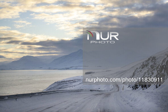 The alternate road 82, along the coastline on the road to the town of Dalvik, Iceland, on November 27, 2024, presents unique challenges due...