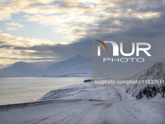 The alternate road 82, along the coastline on the road to the town of Dalvik, Iceland, on November 27, 2024, presents unique challenges due...