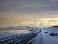 The alternate road 82, along the coast on the way to the town of Hjalteyri, Iceland, on November 27, 2024, presents unique challenges due to...