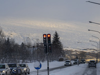 A traffic light is at an intersection on route number 1 (Ring Road) near the city of Akureyri, Iceland, on November 27, 2024. Roads in north...