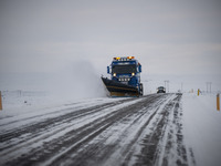 A snow plow vehicle clears Route 1 (Ring Road) on the way to the city of Akureyri, Iceland, on November 27, 2024. Roads in northern Iceland...