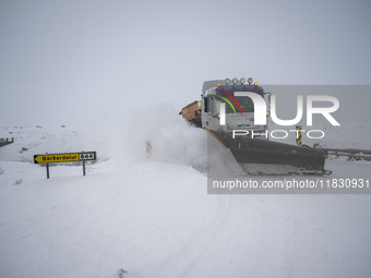 A snow plow vehicle clears Route 1 (Ring Road) on the way to the city of Akureyri, Iceland, on November 27, 2024. Roads in northern Iceland...