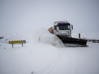 A snow plow vehicle clears Route 1 (Ring Road) on the way to the city of Akureyri, Iceland, on November 27, 2024. Roads in northern Iceland...