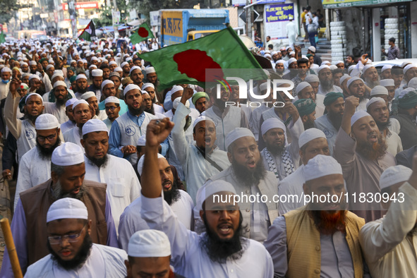 Members of the Islami Andolan Bangladesh party hold a demonstration protest against the breach of premises at the Bangladesh assistant high...