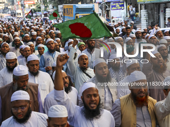 Members of the Islami Andolan Bangladesh party hold a demonstration protest against the breach of premises at the Bangladesh assistant high...