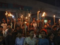 Members of the Islami Andolan Bangladesh party hold a demonstration protest against the breach of premises at the Bangladesh assistant high...