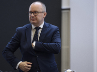 Polish Justice Minister Adam Bodnar appears before a cabinet meeting with Polish Prime Minister Donald Tusk and Secretary-General of the Cou...