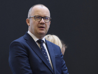 Polish Justice Minister Adam Bodnar appears before a cabinet meeting with Polish Prime Minister Donald Tusk and Secretary-General of the Cou...