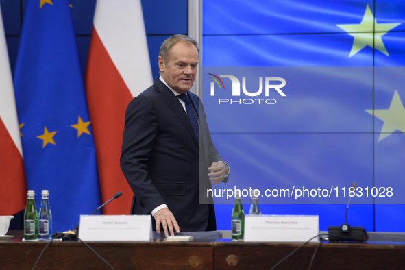 Polish Prime Minister Donald Tusk arrives at a meeting with Secretary-General of the Council of the European Union (EU) Therese Blanchet in...