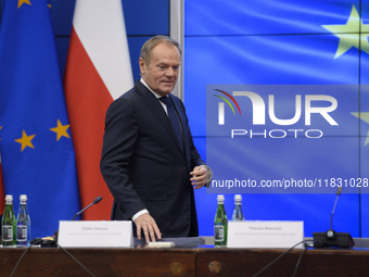 Polish Prime Minister Donald Tusk arrives at a meeting with Secretary-General of the Council of the European Union (EU) Therese Blanchet in...