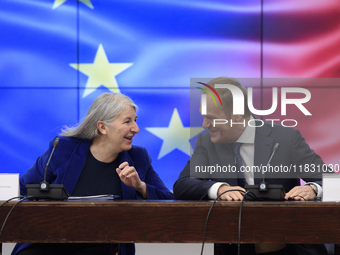 Polish Prime Minister Donald Tusk and Secretary-General of the Council of the European Union Therese Blanchet participate in a meeting with...