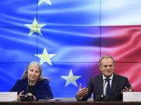 Polish Prime Minister Donald Tusk and Secretary-General of the Council of the European Union Therese Blanchet participate in a meeting with...