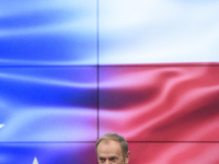 Polish Prime Minister Donald Tusk gestures as he speaks during a meeting with the Secretary-General of the Council of the European Union (EU...