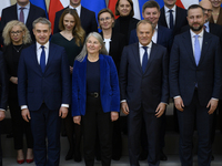 Polish Prime Minister Donald Tusk and the Polish Ministerial Cabinet pose for a family photo with Secretary-General of the Council of the Eu...