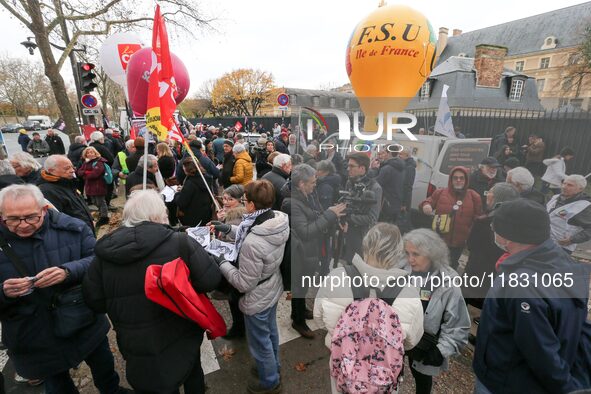 Retirees participate in a rally to call for pensions to be raised with inflation in Paris, France, on December 3, 2024, near the Prime Minis...