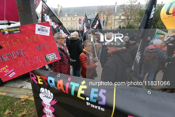 Retirees participate in a rally to call for pensions to be raised with inflation in Paris, France, on December 3, 2024, near the Prime Minis...