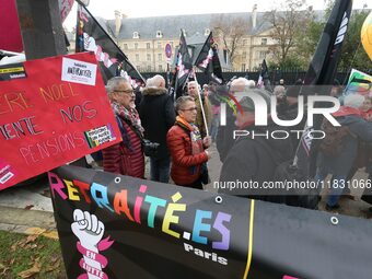 Retirees participate in a rally to call for pensions to be raised with inflation in Paris, France, on December 3, 2024, near the Prime Minis...