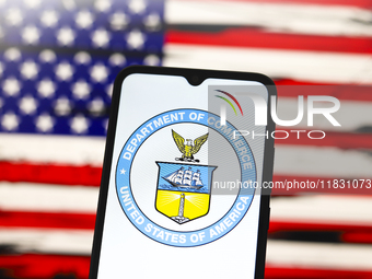 The United States Department of Commerce (DOC) logo appears on the screen of a smartphone, and in the background, the flag of the United Sta...