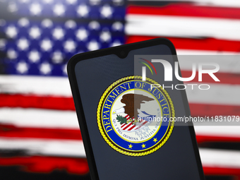 The United States Department of Justice (DOJ) logo appears on the screen of a smartphone, and in the background, the flag of the United Stat...