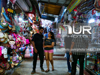 Shops are near Kempty Falls in Mussoorie, Uttarakhand, India, on April 18, 2024. (