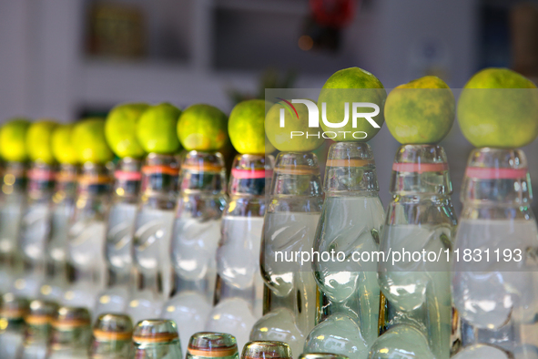 Bottles of cold lime water (nimbu paani) are at a small shop in Mussoorie, Uttarakhand, India, on April 18, 2024. 