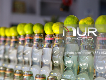 Bottles of cold lime water (nimbu paani) are at a small shop in Mussoorie, Uttarakhand, India, on April 18, 2024. (