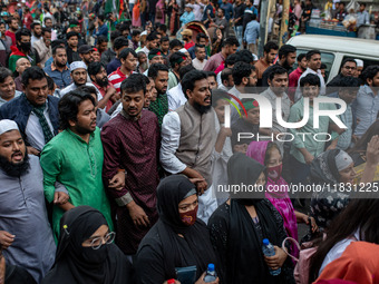 Activists of the Jatiya Nagarik Committee (National Citizens Committee) stage a protest rally against the attack on the Bangladesh Assistant...