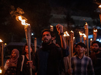 Bangladeshi activists of the Democratic Students Alliance stage a protest rally and torch procession against the attack on the Bangladesh As...