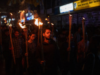 Bangladeshi activists of the Democratic Students Alliance stage a protest rally and torch procession against the attack on the Bangladesh As...