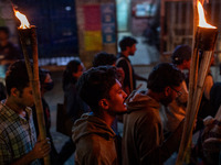 Bangladeshi activists of the Democratic Students Alliance stage a protest rally and torch procession against the attack on the Bangladesh As...