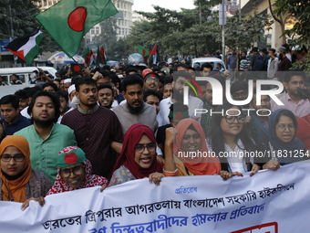 Activists of the Jatiya Nagarik Committee stage a protest rally against the attack on the Bangladesh Assistant High Commission in Agartala a...